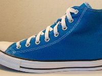 Cyan Space High Top Chucks  Outside view of a left cyan space high top.